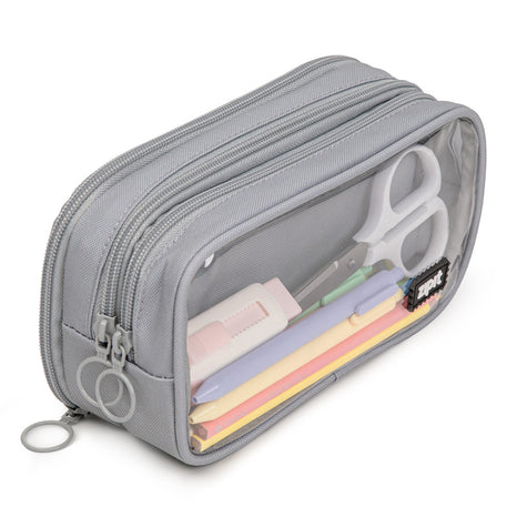 A mint green pencil case with a transparent front, showing pens and a scissors inside, and a zipper closure at the top.