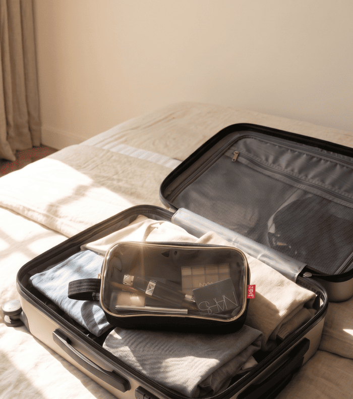 <div>
<span>MEET YOUR NEW</span>
</div><br>
<div>
<span>TRAVEL ESSENTIALS</span>
</div>