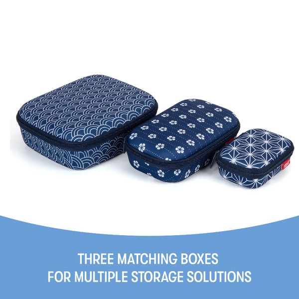 Three colorful zip-up storage cases with floral and striped patterns on a white background.